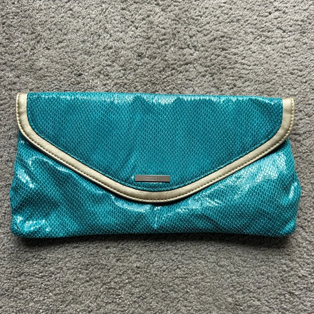 Kenneth Cole‎ Reaction Clutch